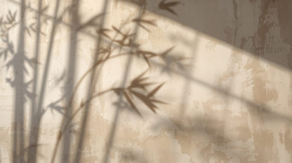 Minimalist calming Warm Beige bamboo shadows featuring plaster wall texture - Wall Mural & Peel and Stick Wallpaper for Minimalist Interiors and Premium Home Styling.