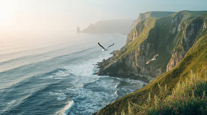 Atmospheric airy Ocean Blue coastal cliffs featuring seagulls and ocean waves - Wall Mural & Peel and Stick Wallpaper for Mural Scene Interiors and Premium Home Styling